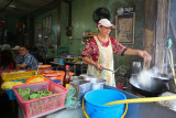 Cook in a restaurant in Chinatown, Kuala Terengganu