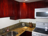Cherry cabinets and granite counters in kitchen