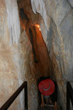Stephs hat disappears into the cave