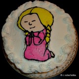 girl praying cake