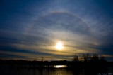 ice halo around the setting sun