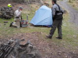 Trevor inspecting Jays Tent Handy Work