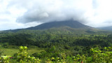 Clouds obscure the peak of Arenal