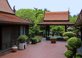 Bird pavilion between houses on the veranda