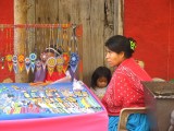 Huichol Indian vendor woman and child, Independencia, Tlaquepaque