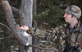 Aron feeding a Black-capped Chickadee