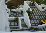Elaborate stairway and balcony in Fira house