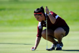 Kayla placing her ball to putt on #3