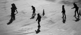 Late afternoon shadows glide across the ice at Wollman Skating Rink in Central Park