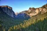 El Capitan, Half Dome and Bridal Veil Falls frame the Yosemite Valley from Tunnel View