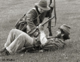 A Confederate Is Wounded And Helped By A Fellow Solder