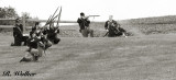 Union Solders Firing On The Confederates And Advancing The Line