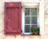 Brown Shuttered-window