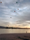Balloons in the air at sunset