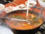Shabushabu- A Spicy Noodle and Pork soup with leafy vegertables