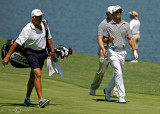 Adam Scott walks up the fairway with caddie Steve Williams at the 93rd PGA Championship