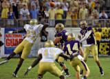 Georgia Tech DE Emmanuel Dieke attempts to knock down a pass from WCU QB Brandon Pwechlof