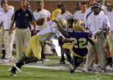 Georgia Tech CB Rod Sweeting upends Western Carolina RB Shaun Warren in the open field