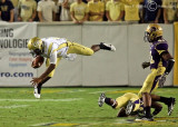 Georgia Tech QB Days goes airborne after being tripped up by a Catamounts defender