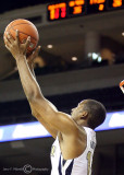 Georgia Tech G Morris catches a pass near the front of the rim