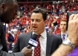 Arizona Wildcats Head Coach Sean Miller is interviewed at halftime by former Wildcats player Corey Williams