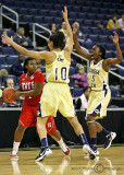 Georgia Tech G Marshall comes in to set a trap on NC State G Goodwin-Coleman…