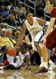 Jackets G Rice corrals a loose ball and moves up court