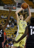 Tech F Brigitte Ardossi shoots over Miami defensive pressure