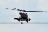 2011 - Coast Guard MH-60J #CG-6036 on a port and harbor patrol just south of downtown Tampa aviation stock photo