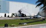 T-hangar debris blown against Miami-Dade Police aviation unit hangar by Hurricane Wilma stock photo #7074