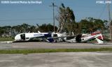 Cylinder Shop Inc.s C-172M N903WA and Wayman Aviations PA-44-180 N81144 after Hurricane Wilma stock photo #7082