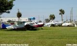 Cylinder Shop Inc.'s Piper PA-28-181 N928WA and other aircraft damaged by Hurricane Wilma stock photo #7090