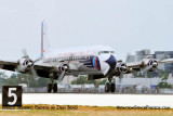 The Historical Flight Foundations restored Eastern Air Lines DC-7B N836D touching down at MIA aviation stock photo