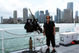 April 2012 - Karen next to one of four M2HB .50 caliber machine guns on the newly commissioned USCGC BERNARD C. WEBBER