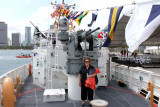 April 2012 - Karen standing under the M242 Bushmaster 25 mm (25×137mm) chain-fed autocannon on the USCGC BERNARD C. WEBBER