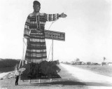 1921 - sign depicting Seminole Jack Tigertail welcomes visitors to Hialeah on County Road (later Okeechobee Road)