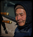 A Chinaman with a 2-string instrument, downtown Toronto