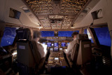 747-8 cruising in a moon lit sky