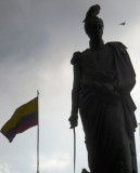 Statue of Bolivar and Flag of Colombia.jpg