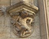 Figure on Rudbeckskolan on the western side of the entrance.