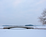 Boardwalk bridge by lake Mälaren.