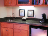 Wet bar with a refrigerator