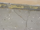 the crack goes all the way across the slab.
