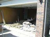 A longer view of the garage work area.