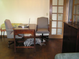 The desk faces the french doors.  The chairs are also from the used office furniture store,