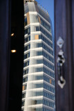 Cooper Square Hotel Tower Reflected in a Residents Front Door Window