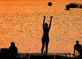 A GIRL, A BALL AND A SUNSET