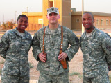 David with two soldiers from his organization.