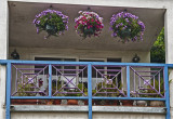 Balcony with flower baskets