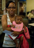 Showing off her new baby at Mothers Restaurant
